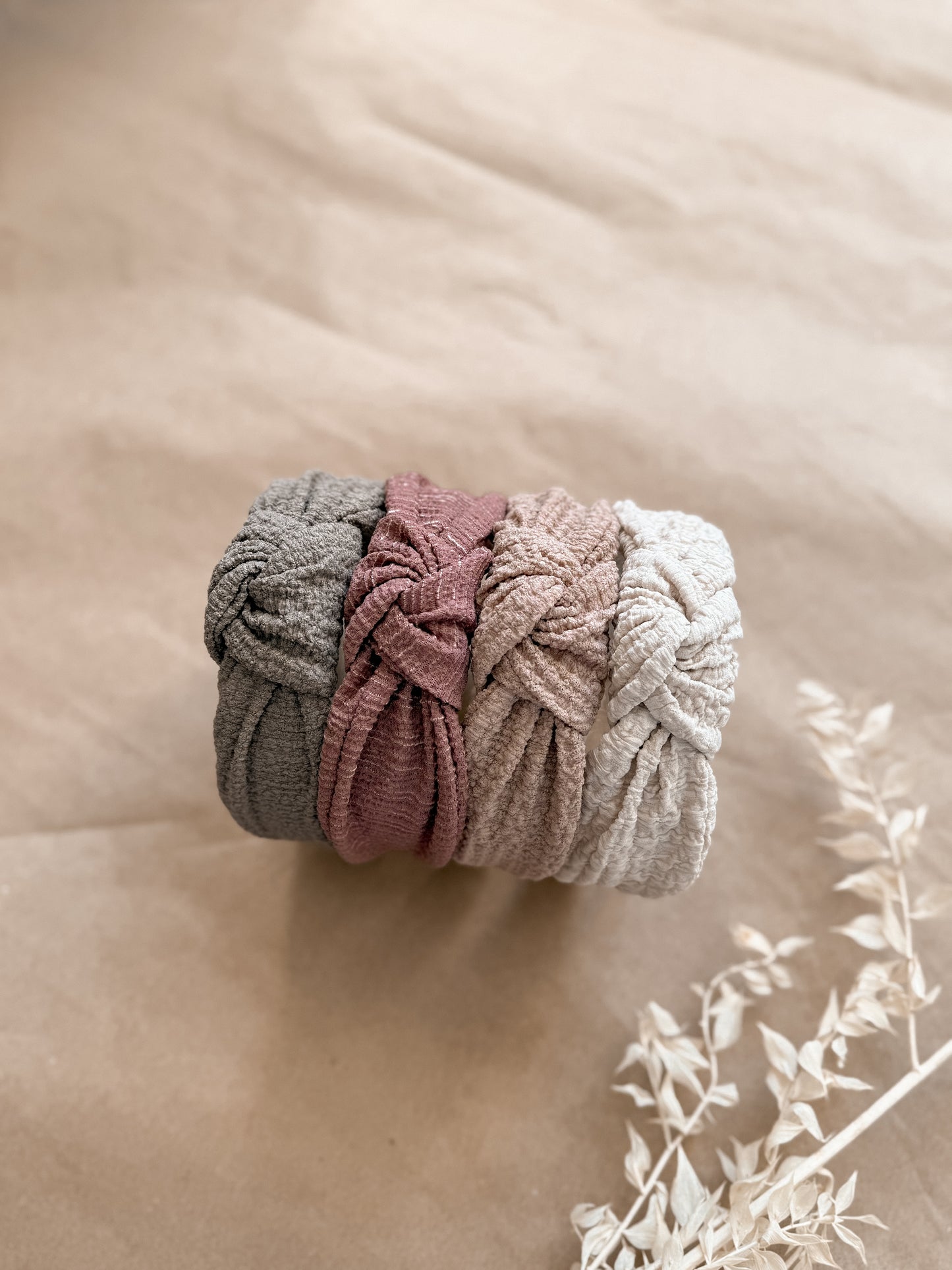 Textured top knot hard headband