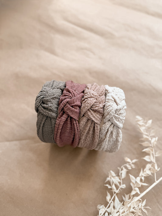 Textured top knot hard headband